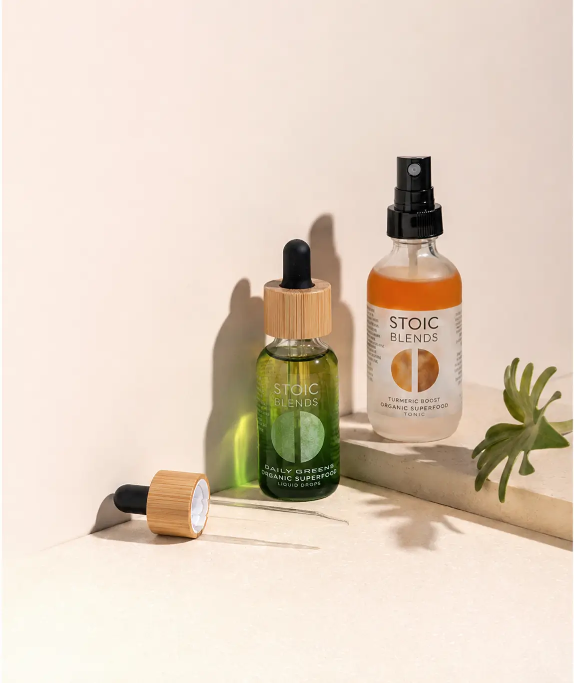 Stoic Beauty sensitive-skincare products: a dropper serum and a facial mist on a neutral background